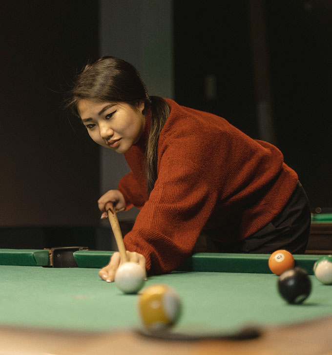 asain woman pool table